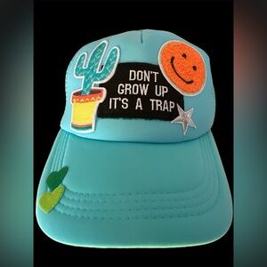 Trucker hat with embroidered patches